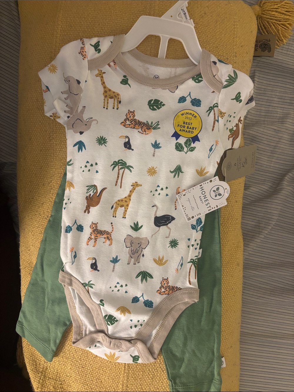 The Honest Company White Baby One-Piece with Green and Tan Safari Print